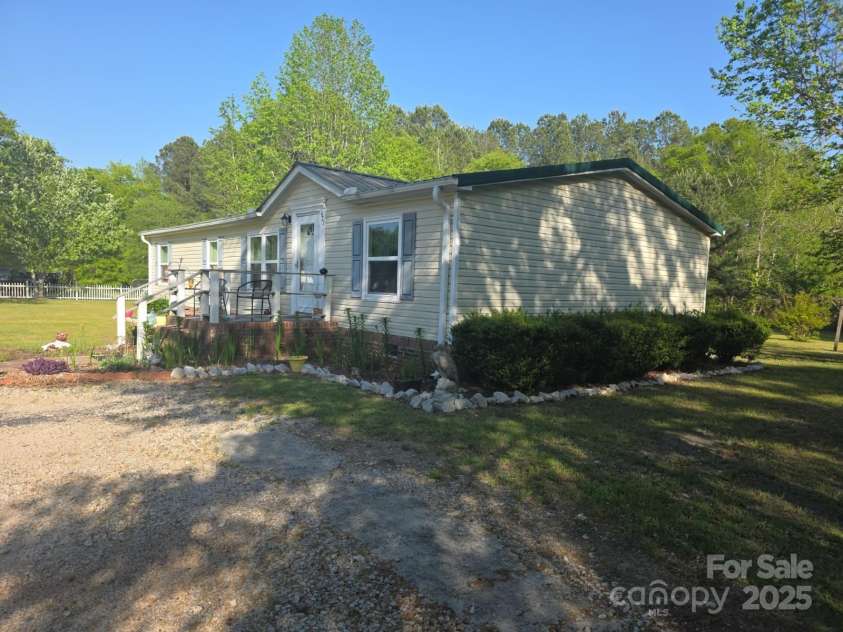 927 Miles Road, Jefferson, SC 29718.  MLS# CAR4247335, YatesRealty ID 6385. Side