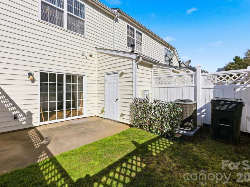 727 Shellstone Place, Fort Mill, SC 29708.  MLS# CAR4359626, YatesRealty ID 6396. Back patio with storage room