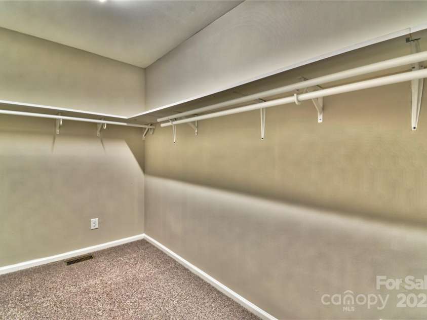 458 Pinehaven Drive, Badin Lake, NC 28127.  MLS# CAR4242649, YatesRealty ID 6402. Large walk-in closet.