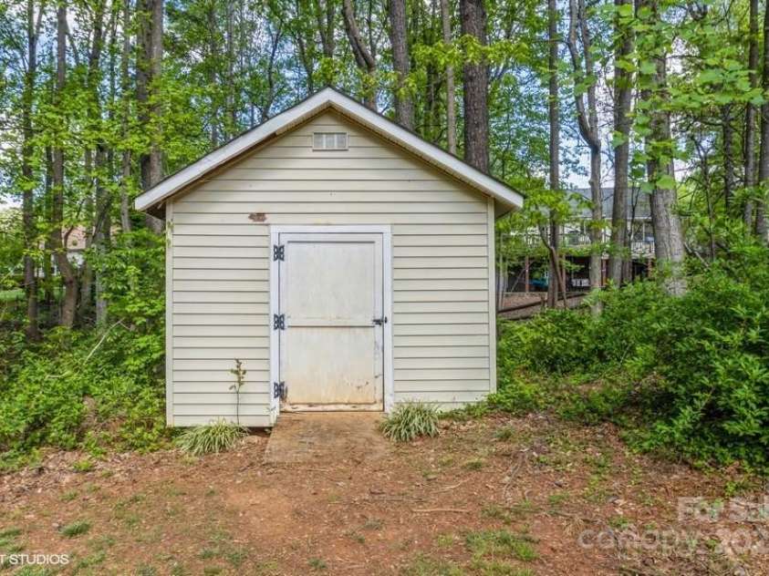 122 Woodstork Cove Road, Mooresville, NC 28117.  MLS# CAR4237078, YatesRealty ID 6407. Shed