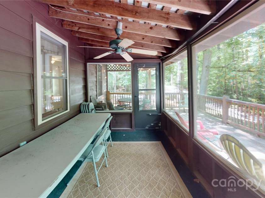 78 Smiling Fox Trail, Brevard, NC 28712.  MLS# CAR4176816, YatesRealty ID 641. Main house enclosed porch