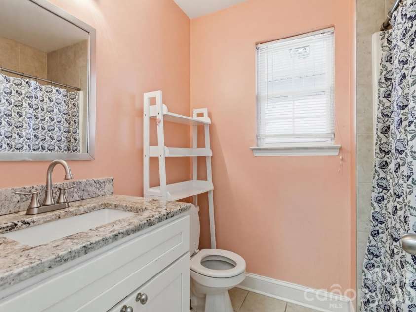 2126 Downing Street, Charlotte, NC 28205.  MLS# CAR4338705, YatesRealty ID 6411. Bathroom- Virtually Staged
