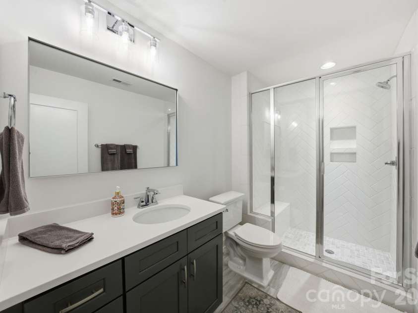16515 Munson Hill Road, Charlotte, NC 28278.  MLS# CAR4393885, YatesRealty ID 6418. Guest Bathroom, Upper Level