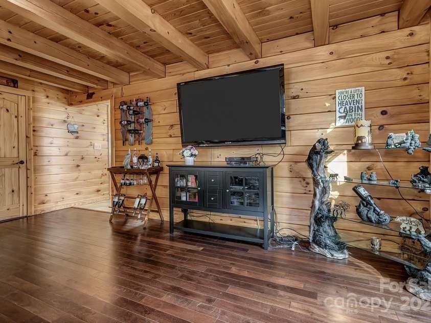 120 Sweetbriar Road, Lake Lure, NC 28746.  MLS# CAR4291551, YatesRealty ID 642. Back through the living room to the kitchen! Entry to the left of the wine rack