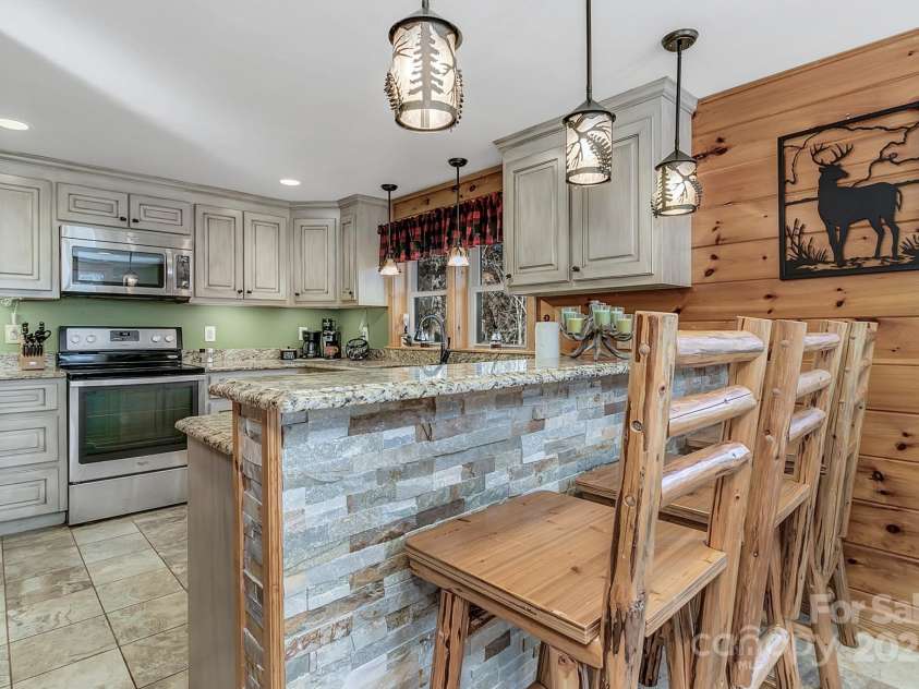 120 Sweetbriar Road, Lake Lure, NC 28746.  MLS# CAR4291551, YatesRealty ID 642. Bar seating at your convenience.