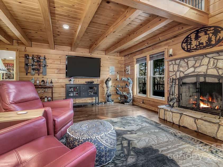 120 Sweetbriar Road, Lake Lure, NC 28746.  MLS# CAR4291551, YatesRealty ID 642. Enjoy fireside conversations or your favorite friday night movie.