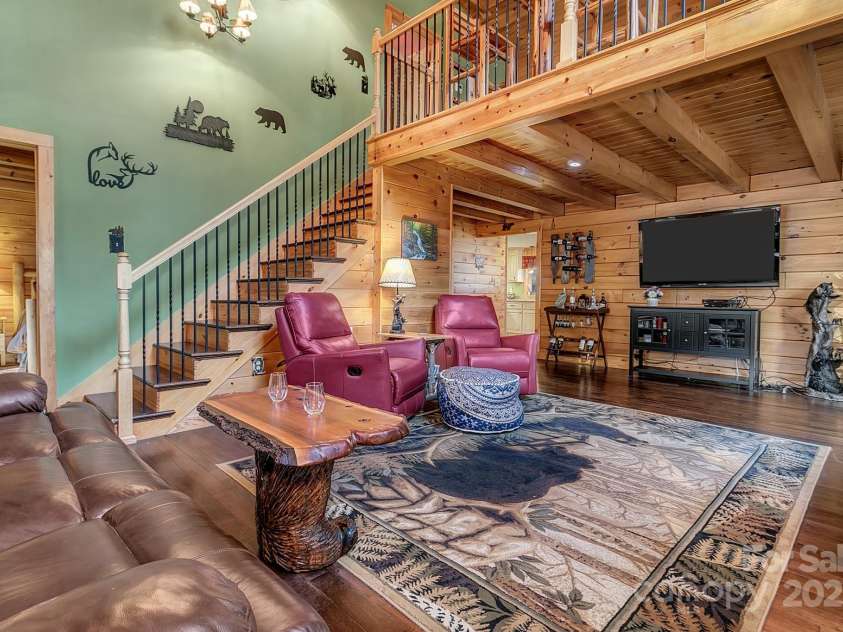 120 Sweetbriar Road, Lake Lure, NC 28746.  MLS# CAR4291551, YatesRealty ID 642. Primary Bedroom conveniently located on the left upon entry.