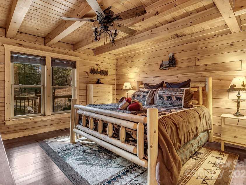 120 Sweetbriar Road, Lake Lure, NC 28746.  MLS# CAR4291551, YatesRealty ID 642. Primary Bedroom - Large windows to let in natural light.