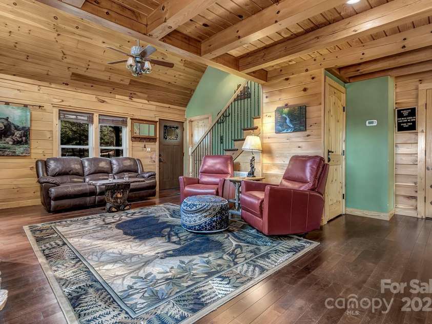 120 Sweetbriar Road, Lake Lure, NC 28746.  MLS# CAR4291551, YatesRealty ID 642. Relax and enjoy family and friends in your cozy living room.