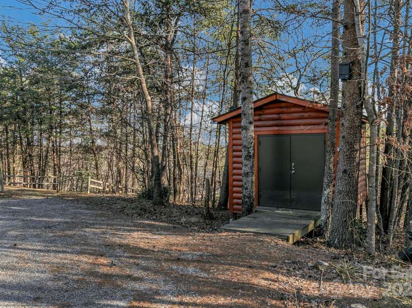 120 Sweetbriar Road, Lake Lure, NC 28746.  MLS# CAR4291551, YatesRealty ID 642. Separate outbuilding for your outdoor storage needs