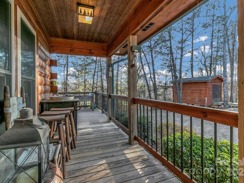 120 Sweetbriar Road, Lake Lure, NC 28746.  MLS# CAR4291551, YatesRealty ID 642. Sit back and relax with plenty of space on the front porch