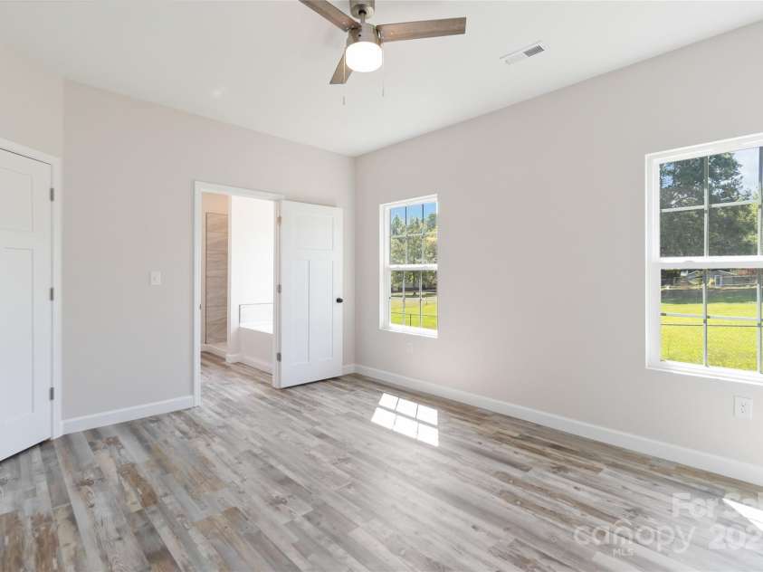 213 Sheffield Drive, York, SC 29745.  MLS# CAR4099016, YatesRealty ID 642. Primary bedroom- entrance to ensuite and closet