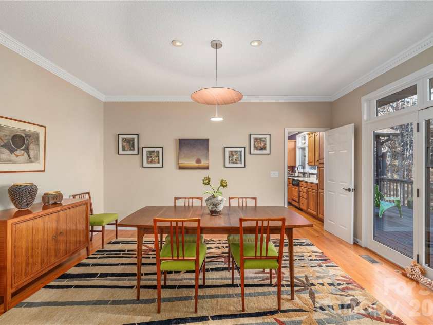 35 Hillcreek Drive, Asheville, NC 28804.  MLS# CAR4338421, YatesRealty ID 6420. Dining room with access to large back deck.