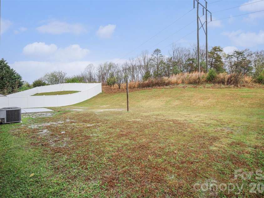 7941 Mossycup Drive, Charlotte, NC 28215.  MLS# CAR4292875, YatesRealty ID 6426. Backyard