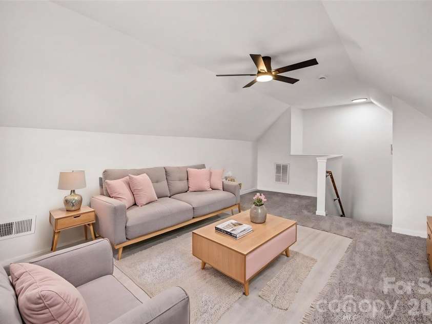 7941 Mossycup Drive, Charlotte, NC 28215.  MLS# CAR4292875, YatesRealty ID 6426. Front Room Over Garage - Bonus Room - *Virtually Staged*