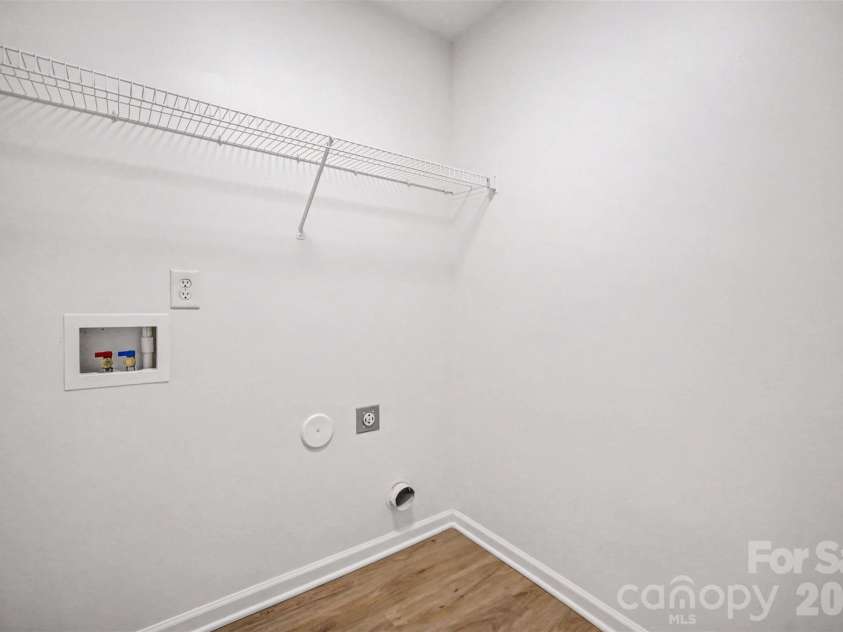 7941 Mossycup Drive, Charlotte, NC 28215.  MLS# CAR4292875, YatesRealty ID 6426. Laundry Room 