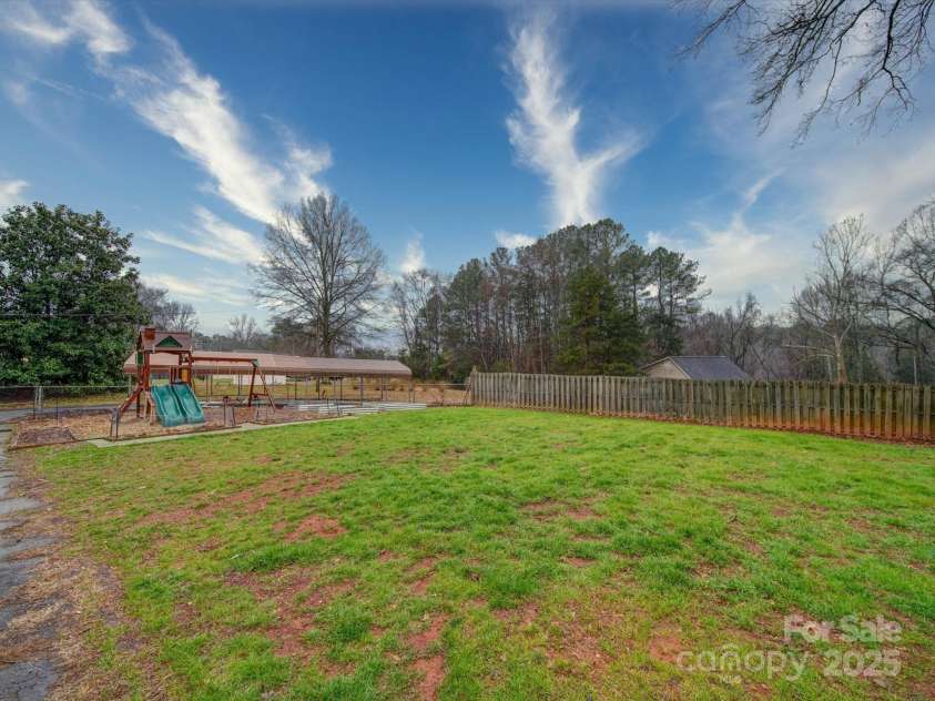 1115 Kelly Road, Mount Holly, NC 28120.  MLS# CAR4237453, YatesRealty ID 6429. 