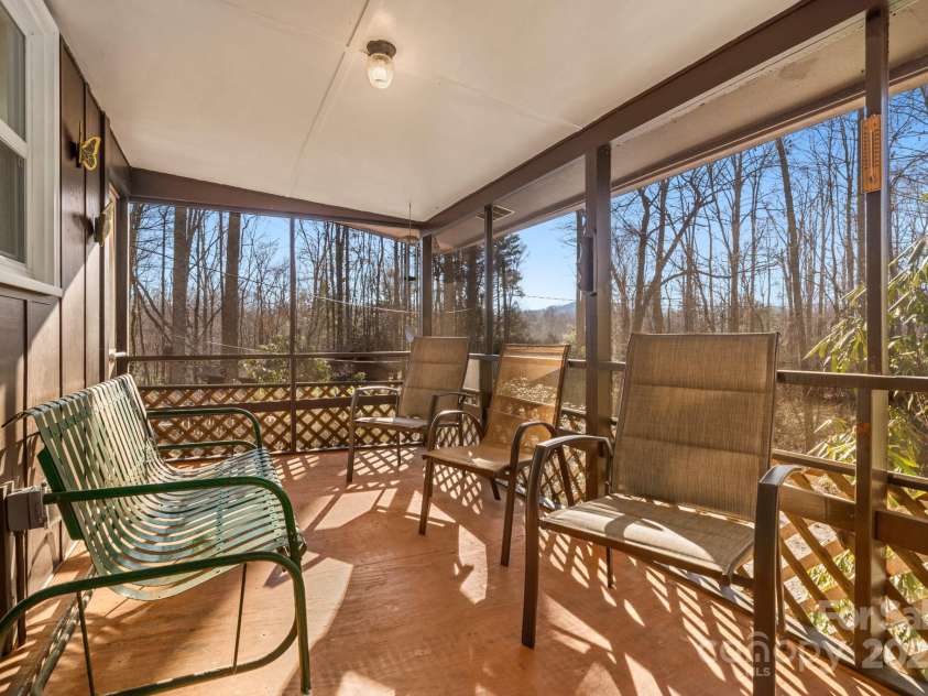 2959/2961 Bearwallow Mountain Road, Hendersonville, NC 28792.  MLS# CAR4209575, YatesRealty ID 6430. Covered Front Porch