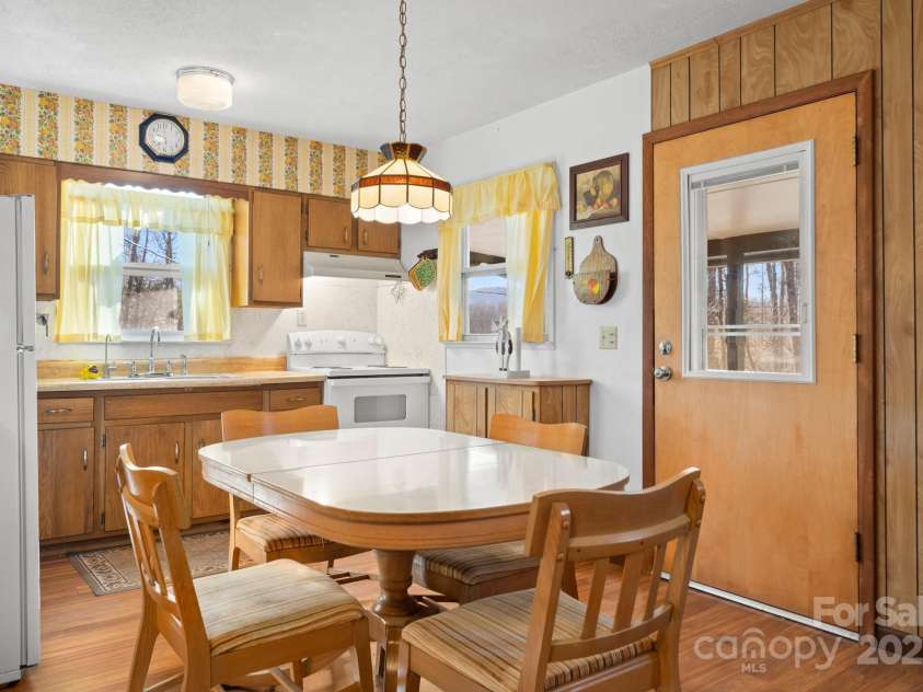 2959/2961 Bearwallow Mountain Road, Hendersonville, NC 28792.  MLS# CAR4209575, YatesRealty ID 6430. Kitchen and Dining