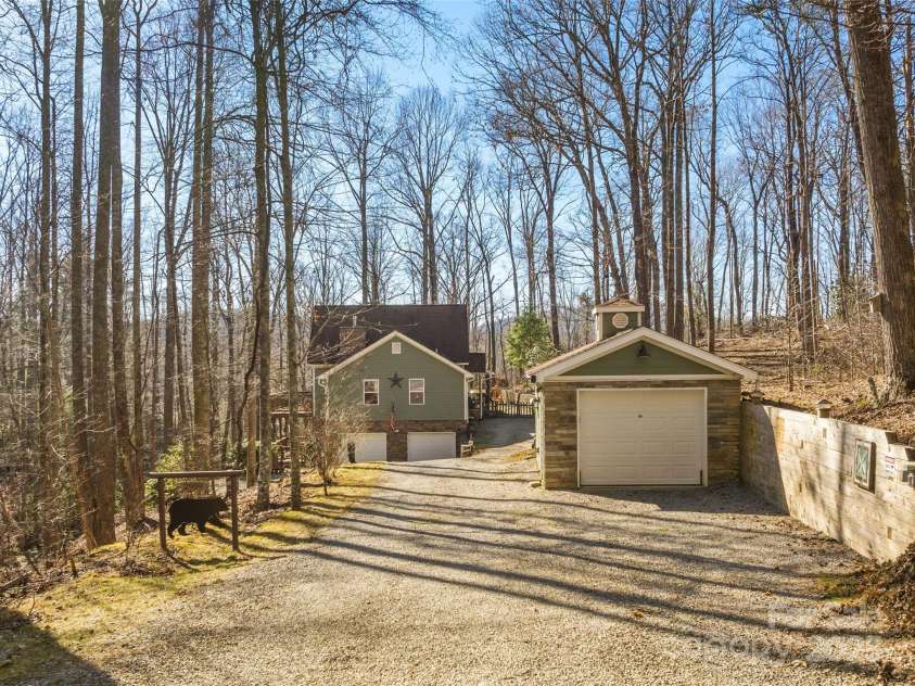 2959/2961 Bearwallow Mountain Road, Hendersonville, NC 28792.  MLS# CAR4320317, YatesRealty ID 6430. Extended 1 car garage in addition to the 2 garages in the main home -