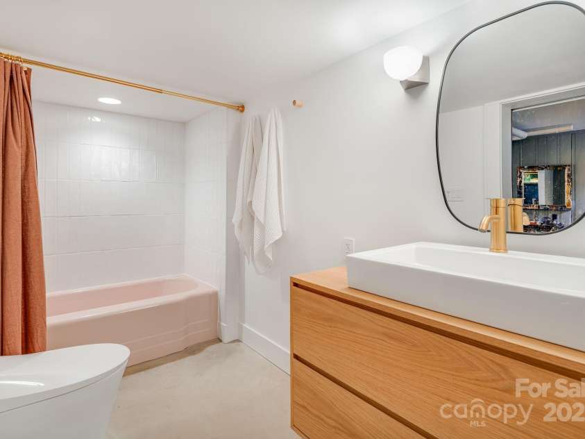 22 Kenilwood Place, Asheville, NC 28803.  MLS# CAR4187020, YatesRealty ID 6432. Full basement bathroom