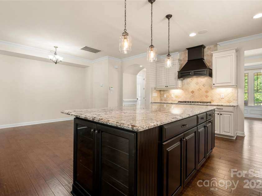 1218 Kings Grove Drive, York, SC 29745.  MLS# CAR4208306, YatesRealty ID 6434. Glass cabinets on both ends of island