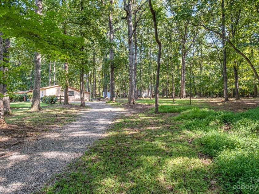 2756 Peachtree Road, Statesville, NC 28625.  MLS# CAR4072282, YatesRealty ID 644. Drive leading to back property. 