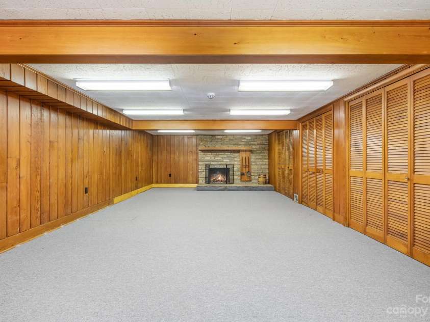 2756 Peachtree Road, Statesville, NC 28625.  MLS# CAR4072282, YatesRealty ID 644. Fabulous basement recreation room with stone fireplace
