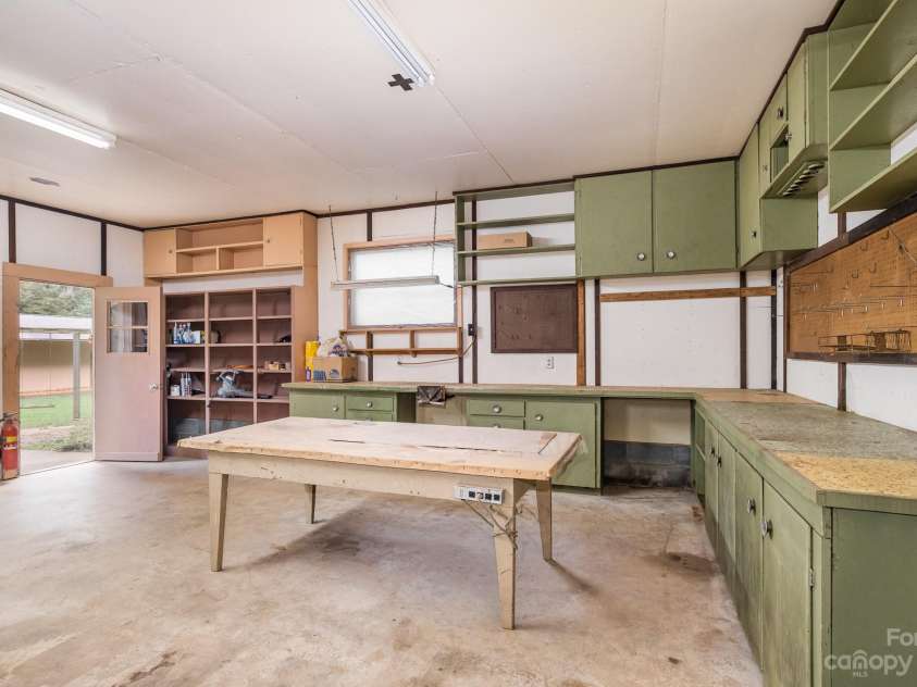 2756 Peachtree Road, Statesville, NC 28625.  MLS# CAR4072282, YatesRealty ID 644. This incredible shop can be a shop but also possibly a second residence although permitting would need to be checked but this building is plumbed and wired and large enough for living space.  