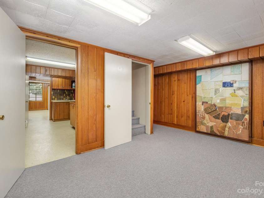 2756 Peachtree Road, Statesville, NC 28625.  MLS# CAR4072282, YatesRealty ID 644. This piece of art will stay.  The door leads to Utility, office/craft/art room.