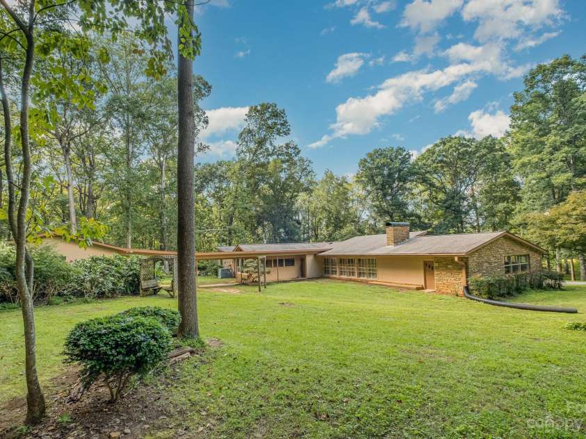 2756 Peachtree Road, Statesville, NC 28625.  MLS# CAR4072282, YatesRealty ID 644. View of back of home.  The door on the right leads to an extra room that could be finished behind garage.