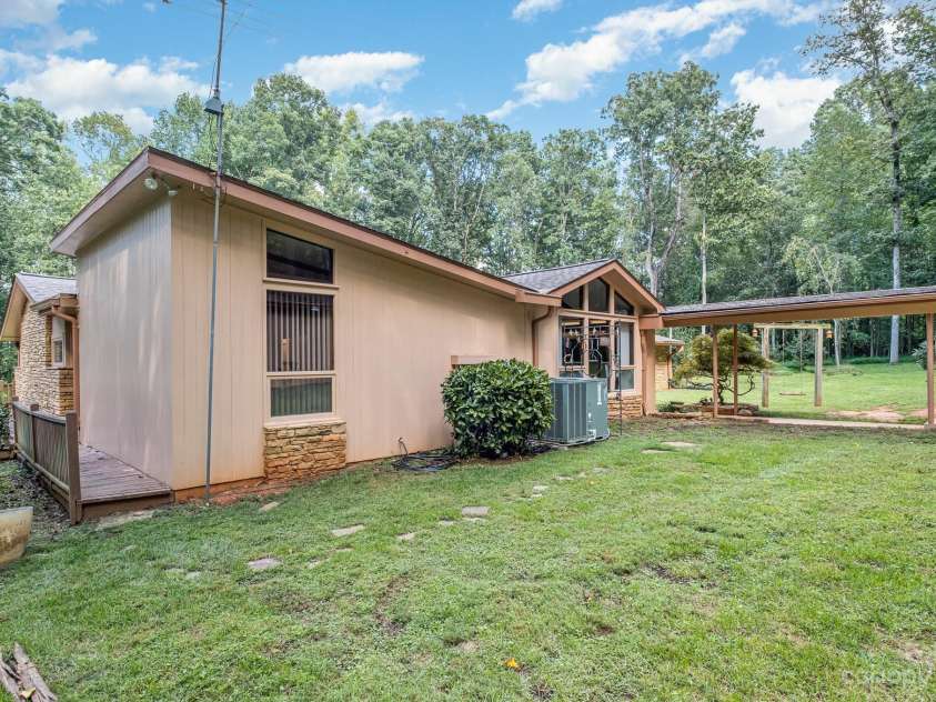2756 Peachtree Road, Statesville, NC 28625.  MLS# CAR4072282, YatesRealty ID 644. View of back of house and breezeway to shop.