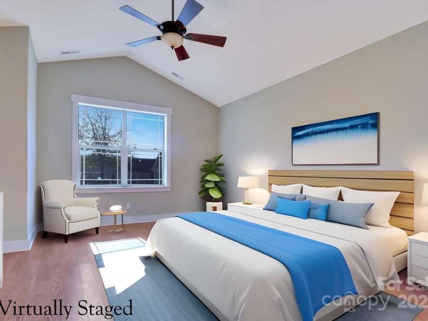 28-S-2 Brookstone Place, Candler, NC 28715.  MLS# CAR4289993, YatesRealty ID 6445. Primary bedroom on main with soaring vaulted ceiling