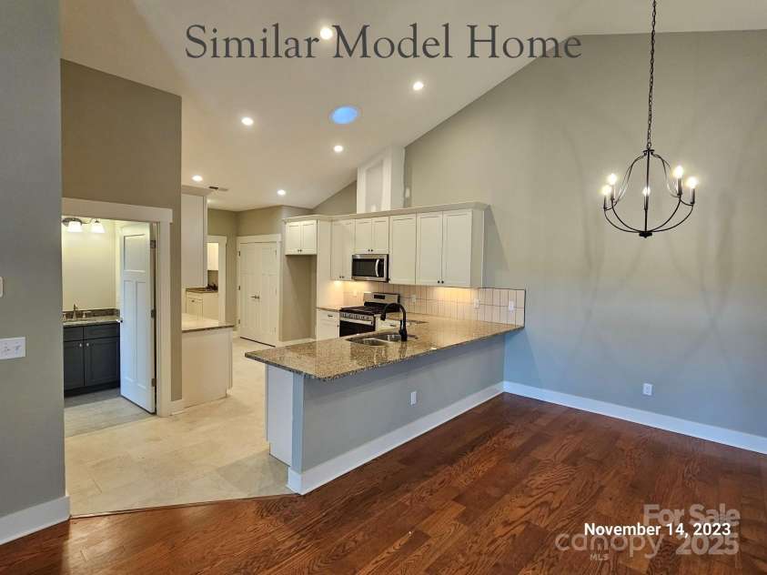 30-S-1 Brookstone Place, Candler, NC 28715.  MLS# CAR4290030, YatesRealty ID 6446. Kitchen - Dining Room