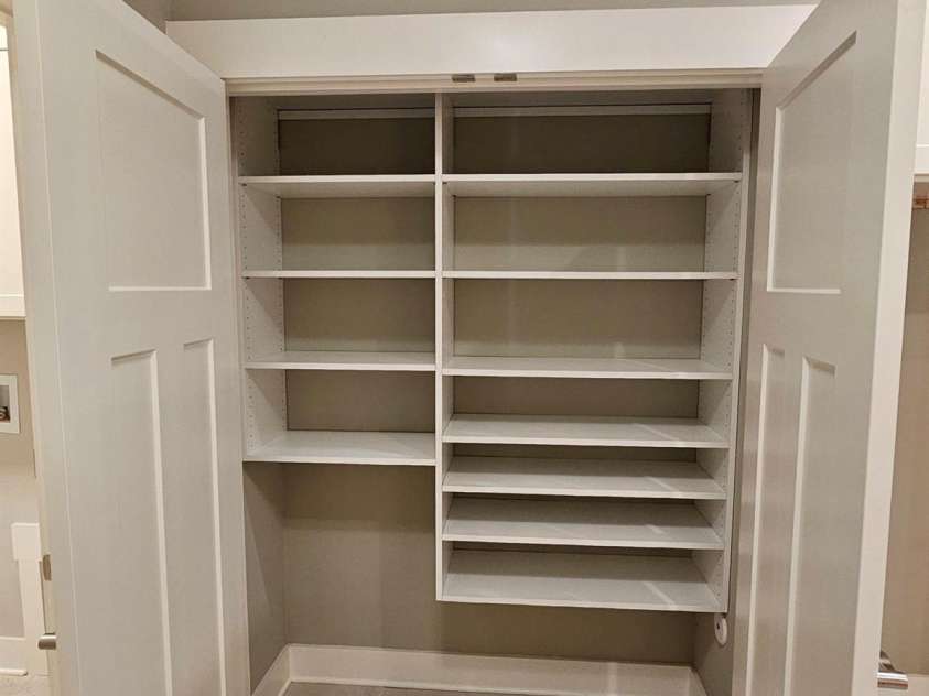 30-S-1 Brookstone Place, Candler, NC 28715.  MLS# CAR4290030, YatesRealty ID 6446. Kitchen Pantry