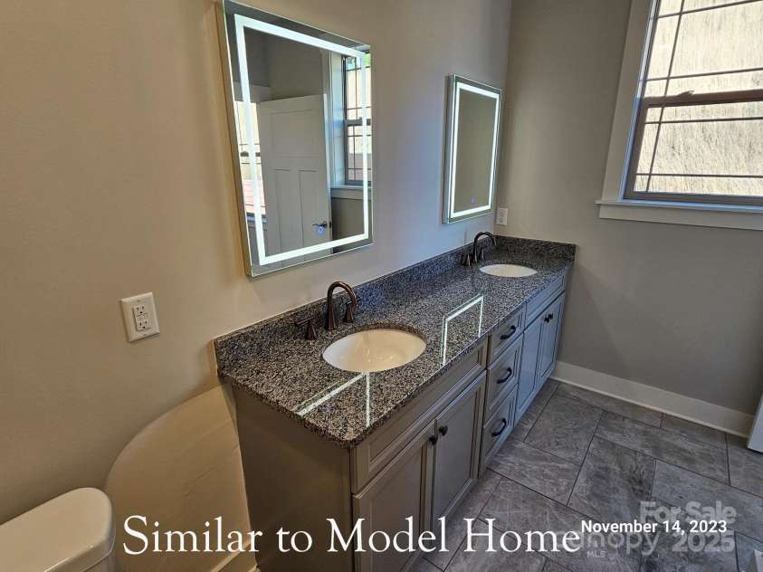 30-S-1 Brookstone Place, Candler, NC 28715.  MLS# CAR4290030, YatesRealty ID 6446. Primary Bathroom