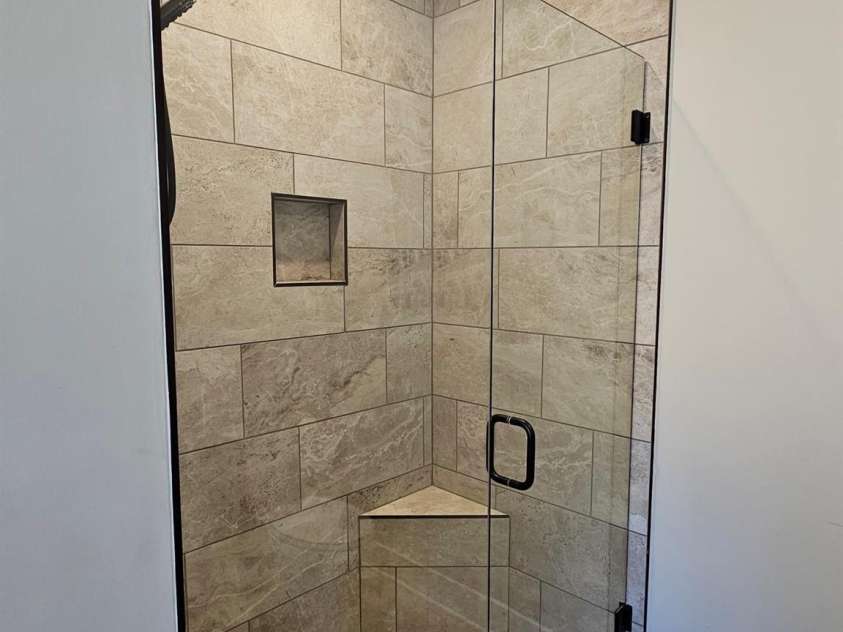 30-S-1 Brookstone Place, Candler, NC 28715.  MLS# CAR4290030, YatesRealty ID 6446. Primary Bathroom Shower