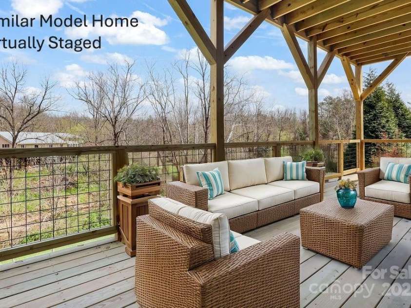 95 Creekside View Drive, Asheville, NC 28804.  MLS# CAR4322333, YatesRealty ID 6450. Lower level covered deck