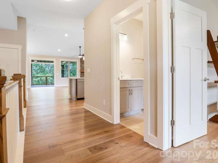 19 Craftsman Overlook Ridge, Arden, NC 28704.  MLS# CAR4342379, YatesRealty ID 6451. Entry hall leading to kitchen and great room.