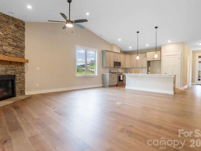 19 Craftsman Overlook Ridge, Arden, NC 28704.  MLS# CAR4342379, YatesRealty ID 6451. Large open concept with vaulted ceilings and ceiling fan