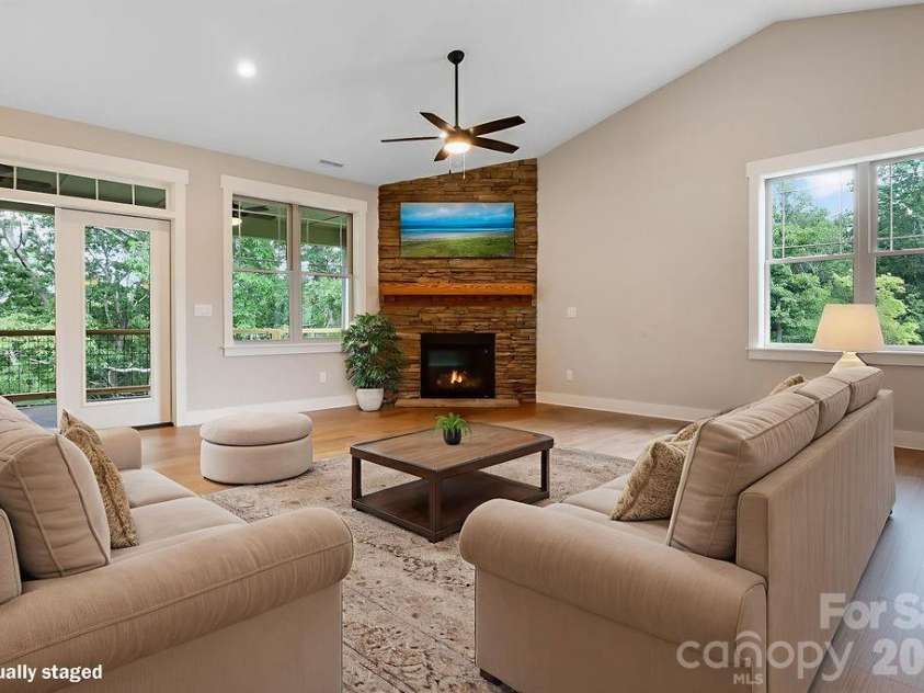 19 Craftsman Overlook Ridge, Arden, NC 28704.  MLS# CAR4342379, YatesRealty ID 6451. Light filled great room.