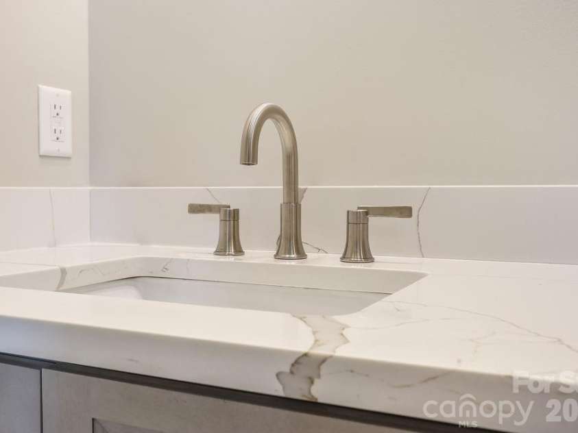 19 Craftsman Overlook Ridge, Arden, NC 28704.  MLS# CAR4342379, YatesRealty ID 6451. Quartz countertops in all bathrooms.