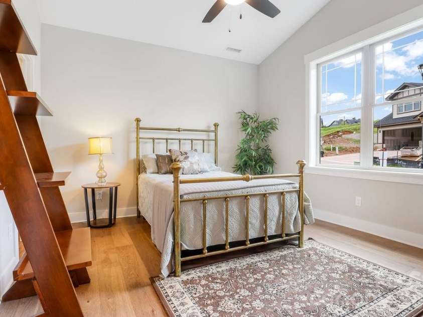 19 Craftsman Overlook Ridge, Arden, NC 28704.  MLS# CAR4342379, YatesRealty ID 6451. Secondary, main level bedroom easily used as a home office or flex space.