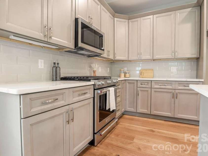 19 Craftsman Overlook Ridge, Arden, NC 28704.  MLS# CAR4342379, YatesRealty ID 6451. Under cabinet lighting with the ease of one switch