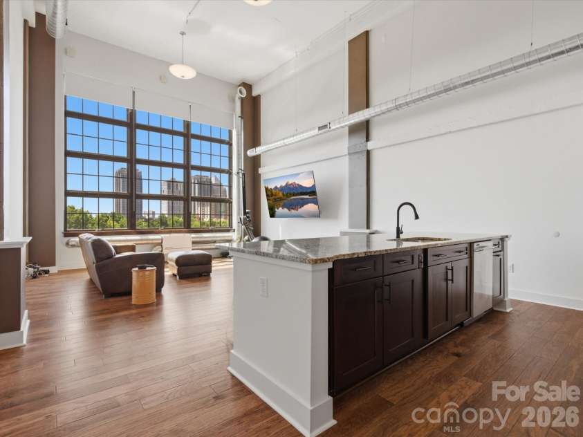 715 Graham Street, Charlotte, NC 28202.  MLS# CAR4383984, YatesRealty ID 6452. Skyline views from your living room and kitchen 