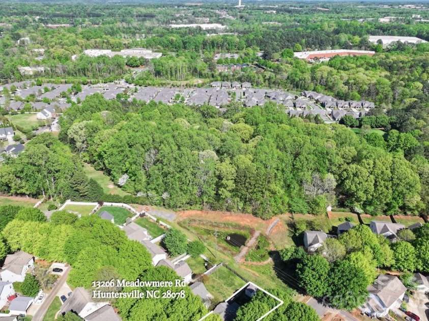 13206 Meadowmere Road, Huntersville, NC 28078.  MLS# CAR4245792, YatesRealty ID 6454. Abuts common area for enhanced privacy