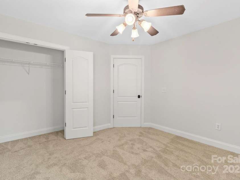 13206 Meadowmere Road, Huntersville, NC 28078.  MLS# CAR4245792, YatesRealty ID 6454. Bedroom 2 features neutral carpeting