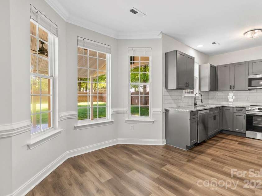 13206 Meadowmere Road, Huntersville, NC 28078.  MLS# CAR4245792, YatesRealty ID 6454. Coffee and bagels are enjoyed in the sunny breakfast area