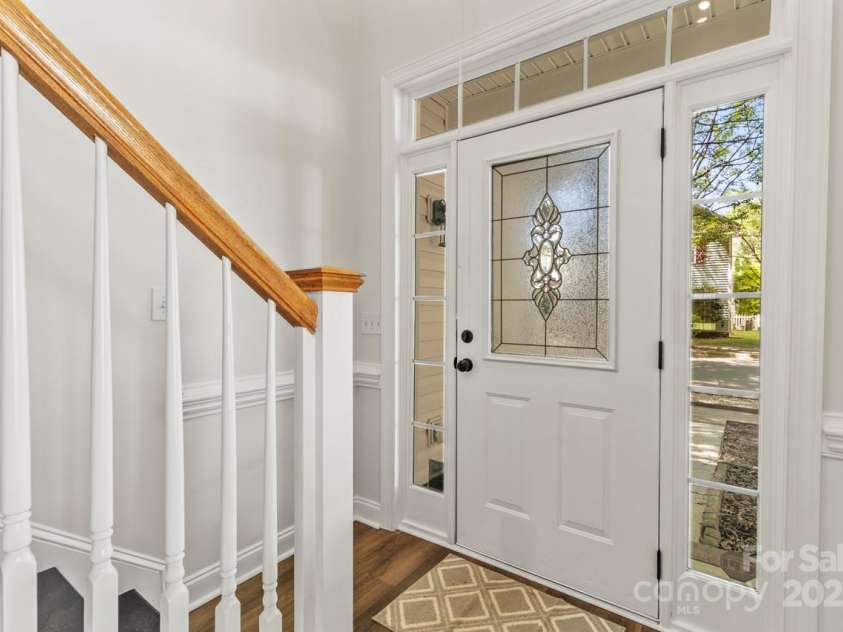 13206 Meadowmere Road, Huntersville, NC 28078.  MLS# CAR4245792, YatesRealty ID 6454. Entry with side lights and transom window above the entrance door