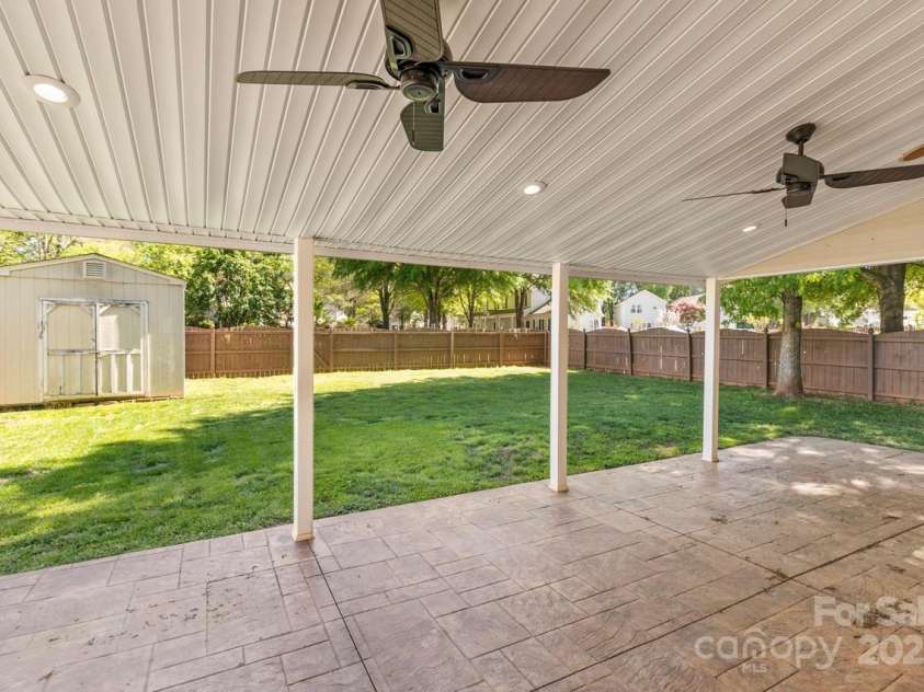 13206 Meadowmere Road, Huntersville, NC 28078.  MLS# CAR4245792, YatesRealty ID 6454. Expansive covered rear patio